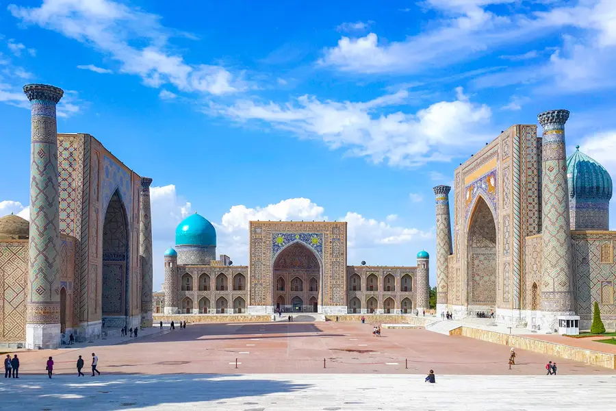 Registan Square in Samarkand under a blue sky